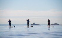 Stand Up Paddle Boarding © Visit Swansea Bay / Swansea Council